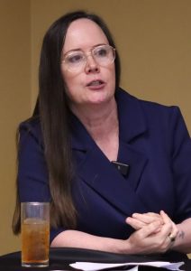 Julie-speaking-at-nela-ga-212x300